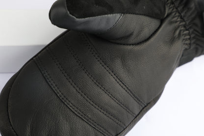 A close-up of a black leather mitten with stitched paneling and a dark gray fabric cuff, shown on a white background.